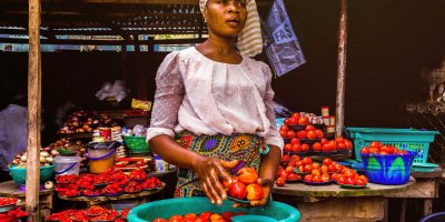Women selling vegtables in a Nigerian market